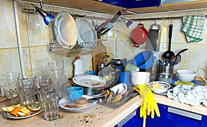 Dirty kitchen unwashed dishes