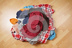 Dirty laundry pile on floor