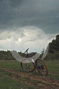 Dirty mountain bike in the forest. mud on bicycle tires