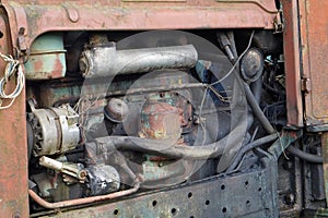 Dirty oiled diesel engine from an old vintage tractor