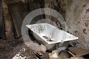 Dirty old bathtub in unsafe House destroyed