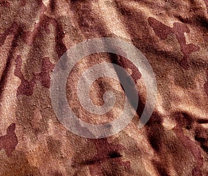Dirty old camouflage cloth pattern.