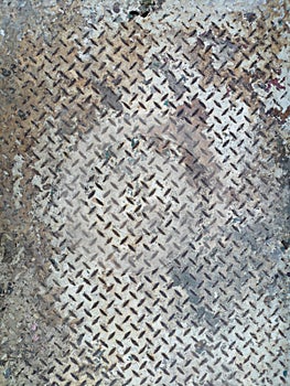 Dirty old diamond steel plate texture close up