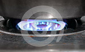 Dirty Old Natural Gas Stove Cooking with Full Flame On.