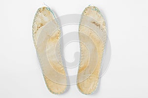 Dirty old shoe insoles.