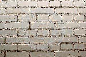 Dirty old white exterior brick wall background