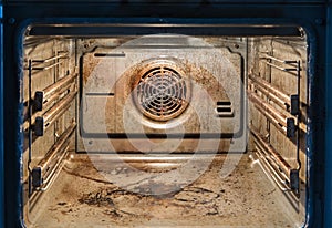 Dirty oven - messy kitchen photo