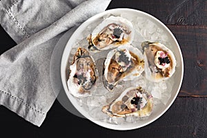 Dirty Oysters Served in a Bowl of Crushed Ice