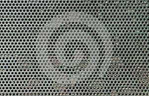 Dirty perforated metallic surface texture background, Rio de Janeiro