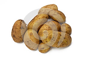 Dirty potatoes isolated on white background