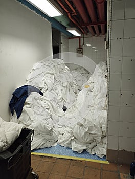 Dirty room linens are separated to facilitate washing sessions photo