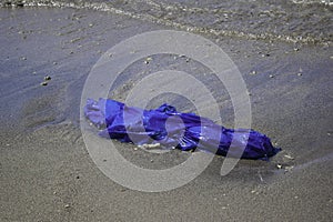 Dirty sea sandy shore the Sea. Environmental pollution. Ecological problem - Pollutions and garbages on the beach