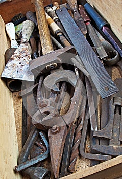Dirty set of hand tools, vintage background with old tools