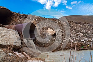 Dirty sewage from the pipe, environmental pollution