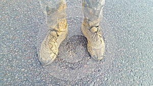 Dirty shoes on road