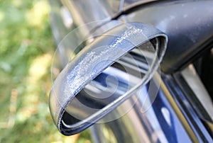 Dirty side mirrors of the old car