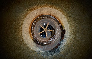 Dirty sink, rusty drain hole.Close up