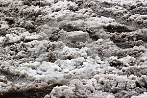 Dirty slushy snow at wintertime