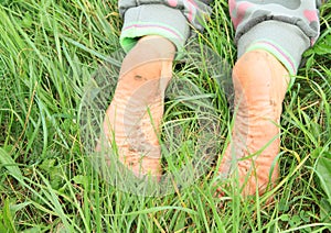 Dirty soles of bare feet