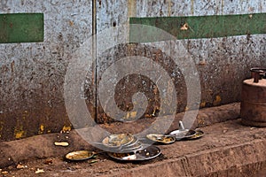 Dirty tableware in a restaurant in the center of Delhi