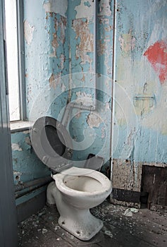 Dirty toilet in derelict victorian mill