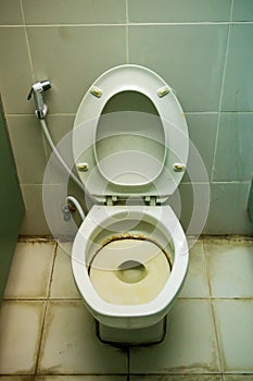 Dirty toilet in a house.Dirty old toilet bowl.