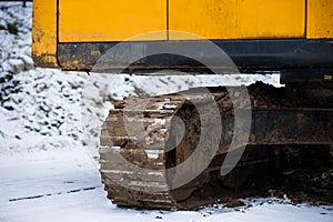 Dirty track of a shovel crawler