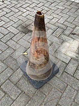 Dirty Traffic cone for road works.