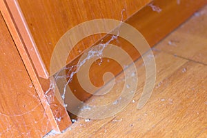 Dirty unswept floor dust cobwebs