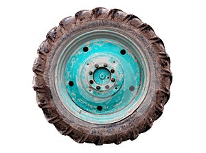 Dirty used tractor wheel on white