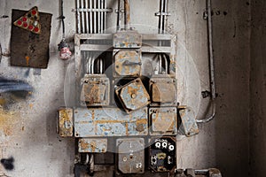 Electrical cabinet in old, abandoned workshop