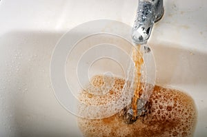 Dirty water in the sink