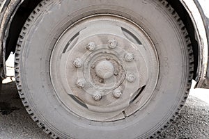 Dirty wheel of the bus wheel hub bearing in the daylight