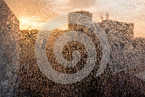 Dirty window glass with dust and dried raindrops