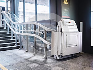 Disability stairs lift facility indoor building Wheelchair elevator photo