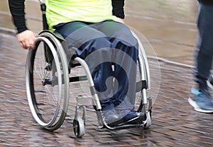 Disabled athlete with the wheelchair during a competition photo