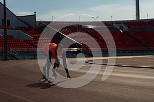 Disabled athletes prepare in starting position ready to run