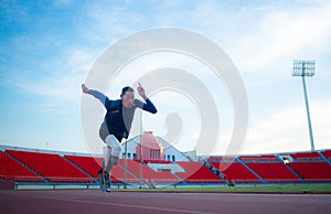 Disabled athletes prepare in starting position ready to run