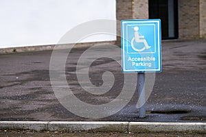 Disabled Badge Holders Only at Car Park Sign Post