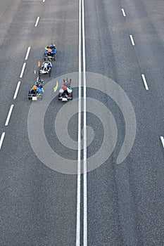 Disabled bike riders on the street. Urban mobility. Sport