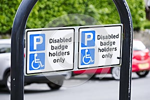 Disabled blue badge holder parking sign for driver