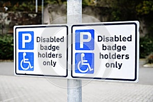 Disabled blue badge holder parking sign for driver