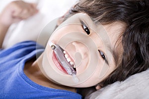 Disabled boy wearing a mouth guard