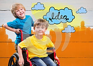 Disabled boy in wheelchair with friend with colorful idea clouds