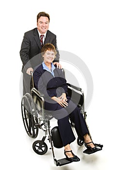 Disabled Businesswoman and Colleague