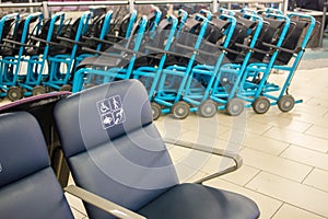 Disabled Chairs and Row of Wheelchairs at Airport