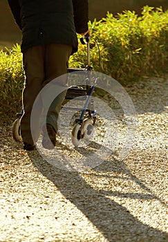 Disabled elderly with medical Walker for walking