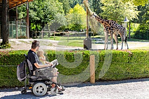 Disabled Father with daughter outside