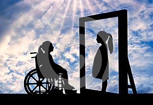 A disabled girl and her healthy reflection in the mirror