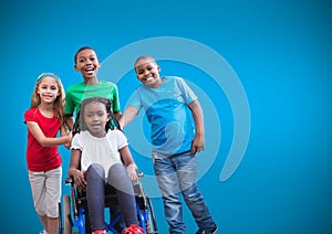 Disabled girl in wheelchair with friends and blue background